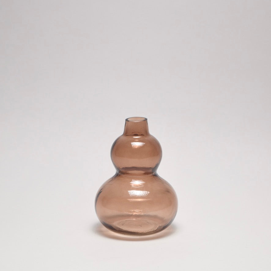 Brown glass vase with curved shape for modern home decor