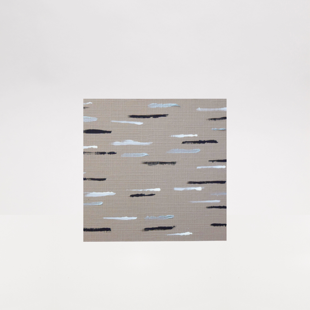 Textured piece of art with abstract pattern on a taupe background