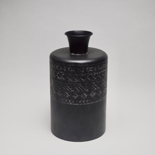Black metal vase with geometric patterns for modern home styling