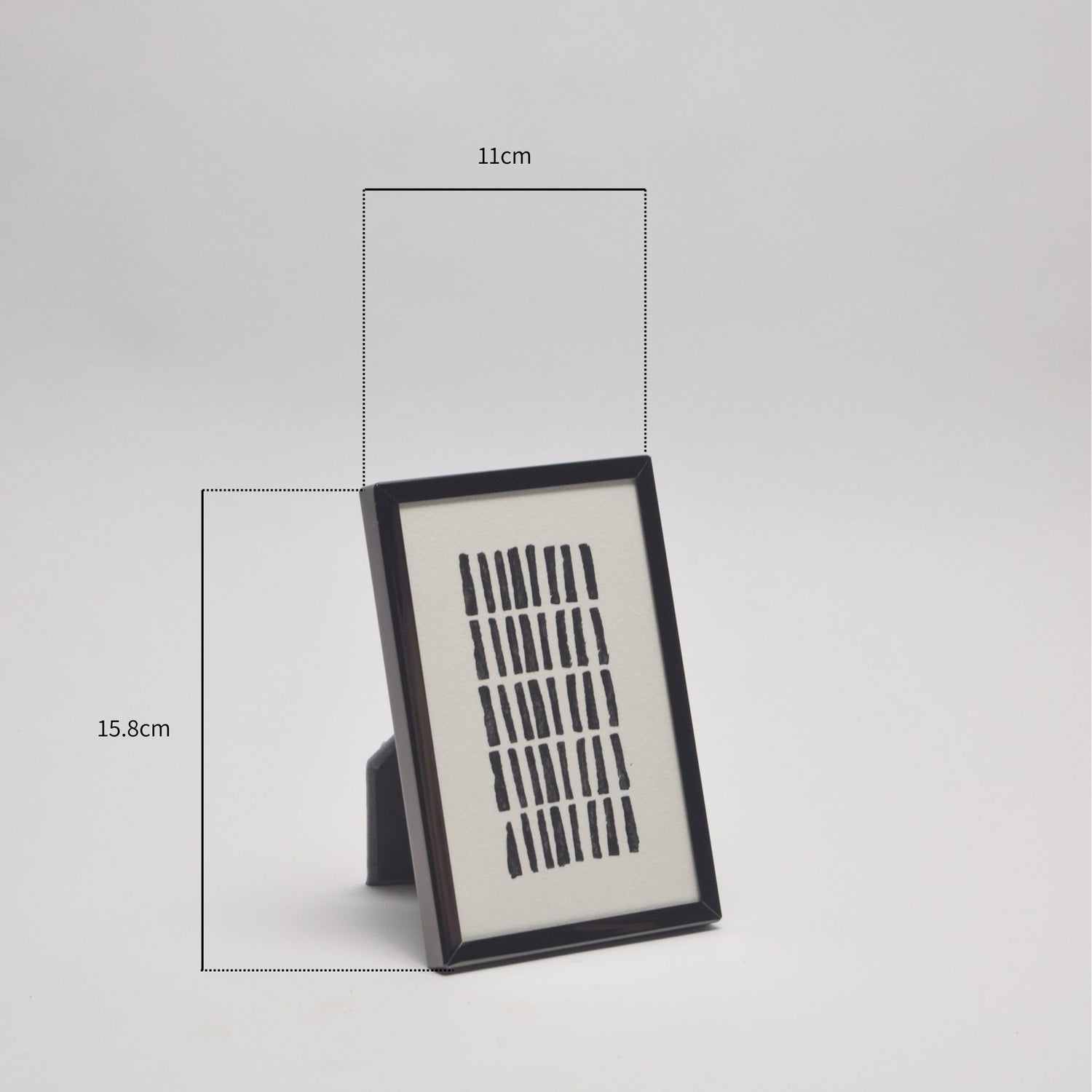 Framed abstract artwork with dimensions on a light background