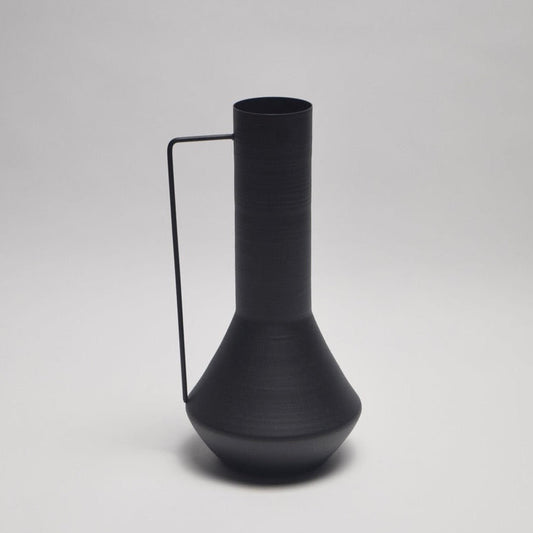 Tall matt black vase with a thin handle for home interior styling of a shelf or sideboard