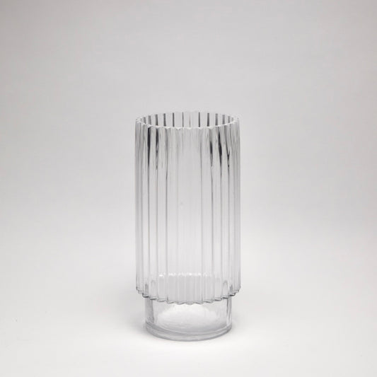 Clear glass vase with ribbed design for contemporary home decor