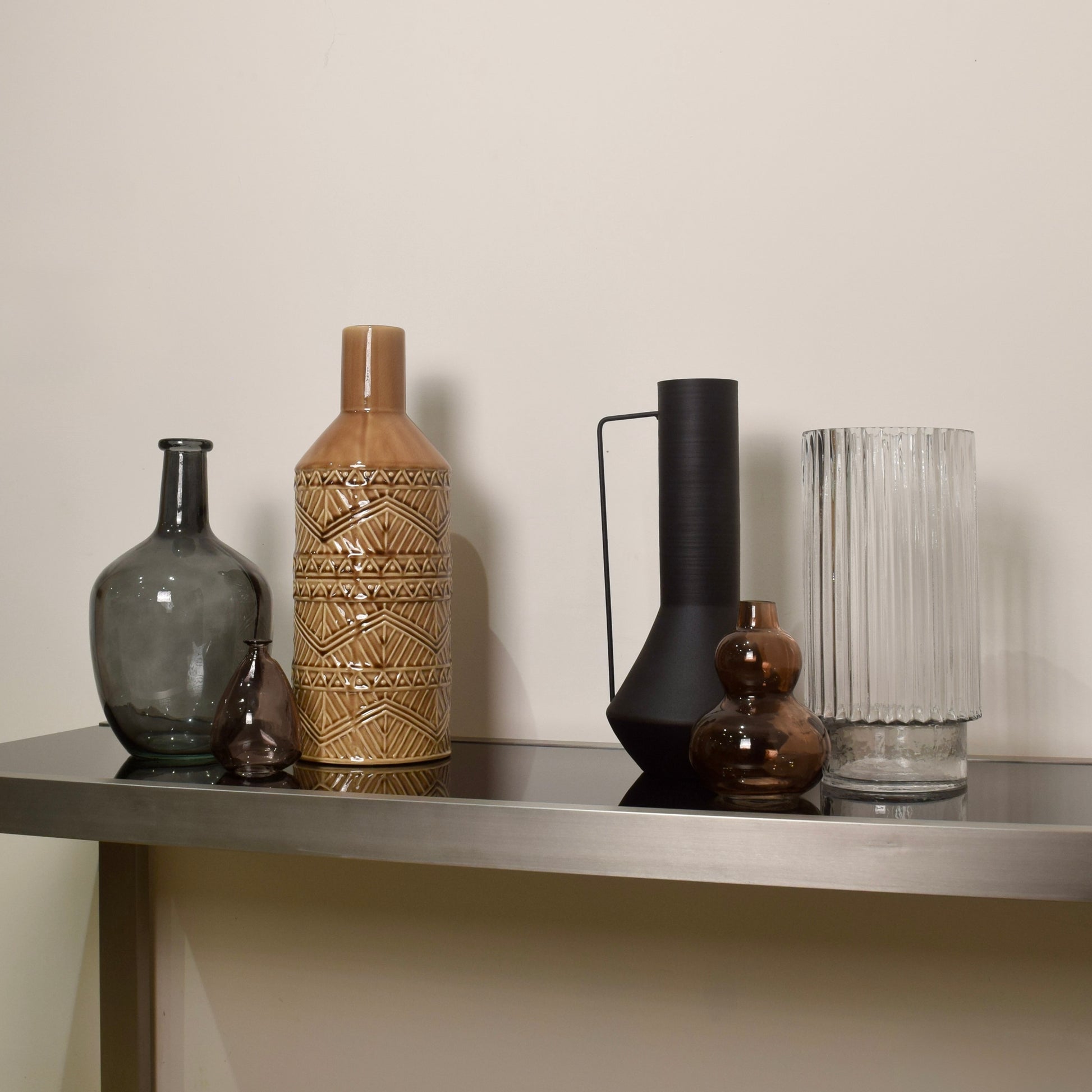 Collection of decorative vases for console table styling