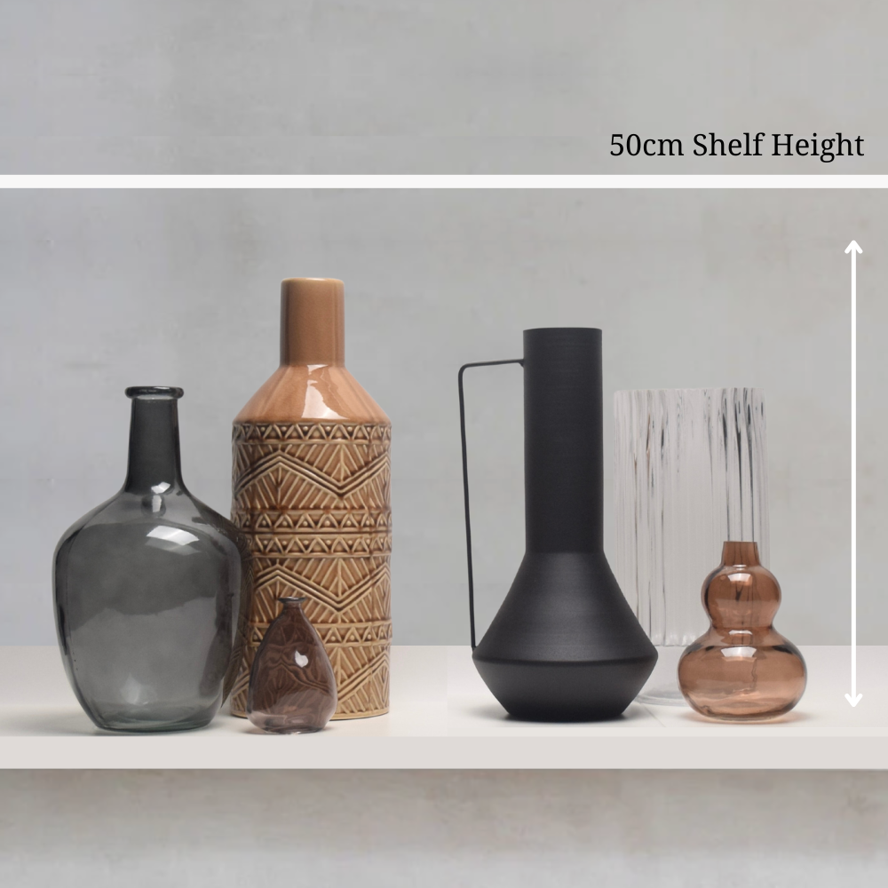 Set of vases on a shelf with a measurement label indicating 50cm shelf height.