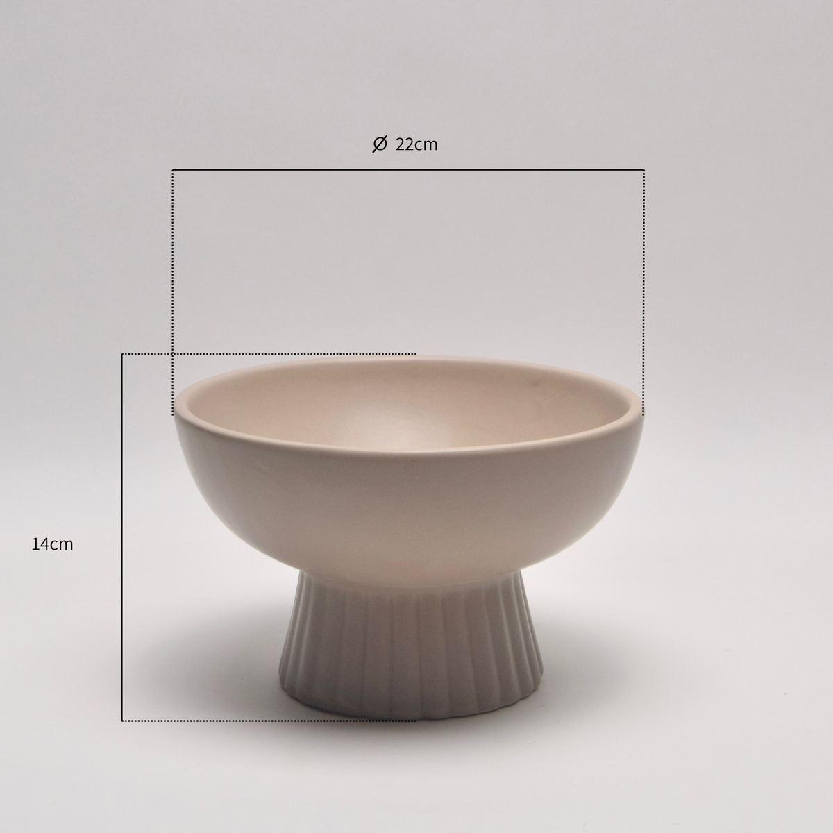 A beige ceramic pedestal bowl with a fluted base,  with dimension annotated.