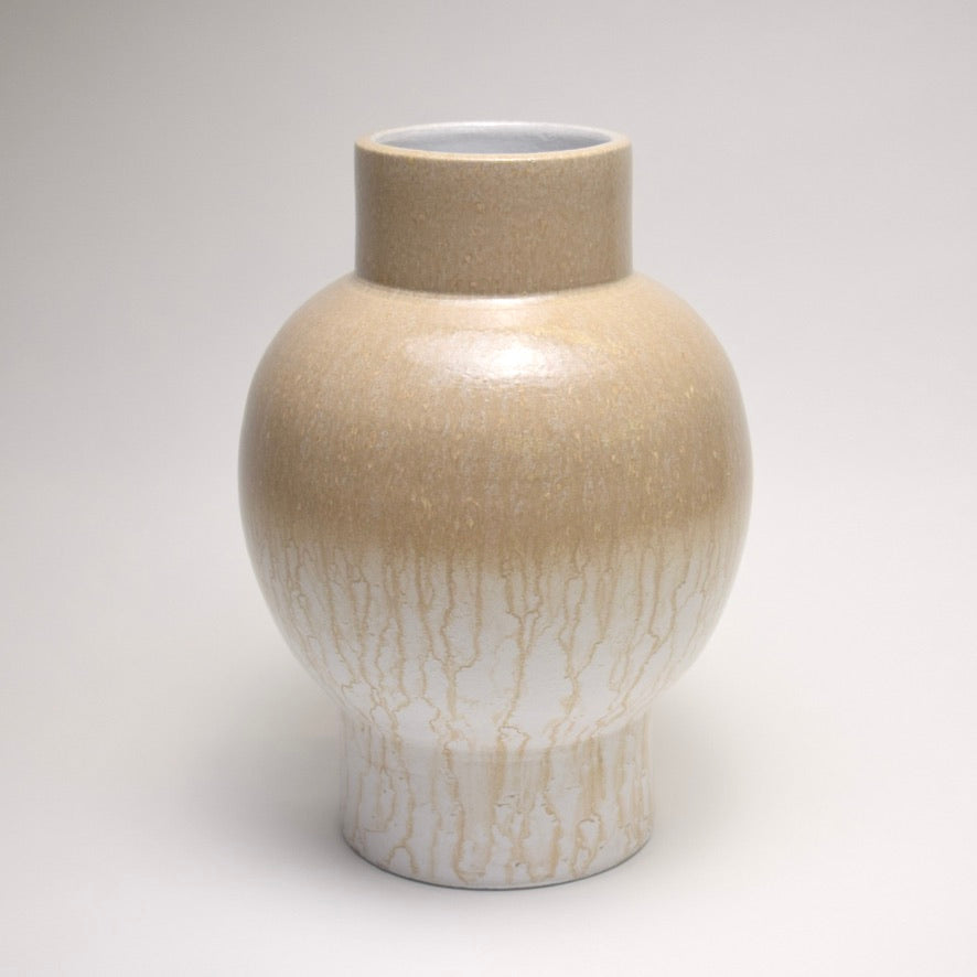 Large glazed terracotta vase with neutral, varied tone surface for modern home interior styling