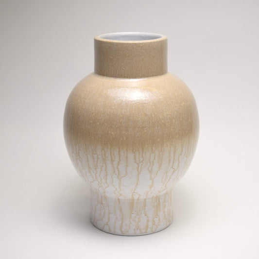 Large glazed terracotta vase with neutral, varied tone surface for modern home interior styling