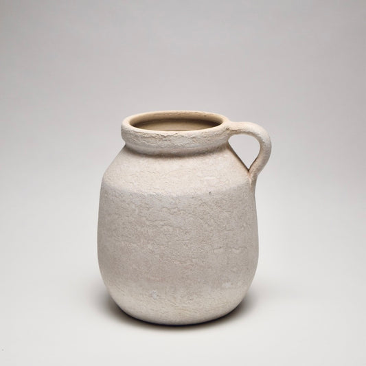 White ceramic vase with a handle for modern home decor