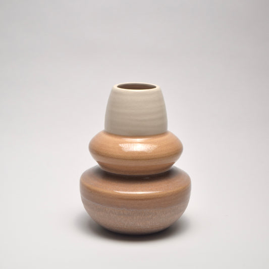 Ceramic vase with three distinct sections with different sand tones creating ombre effect for home styling