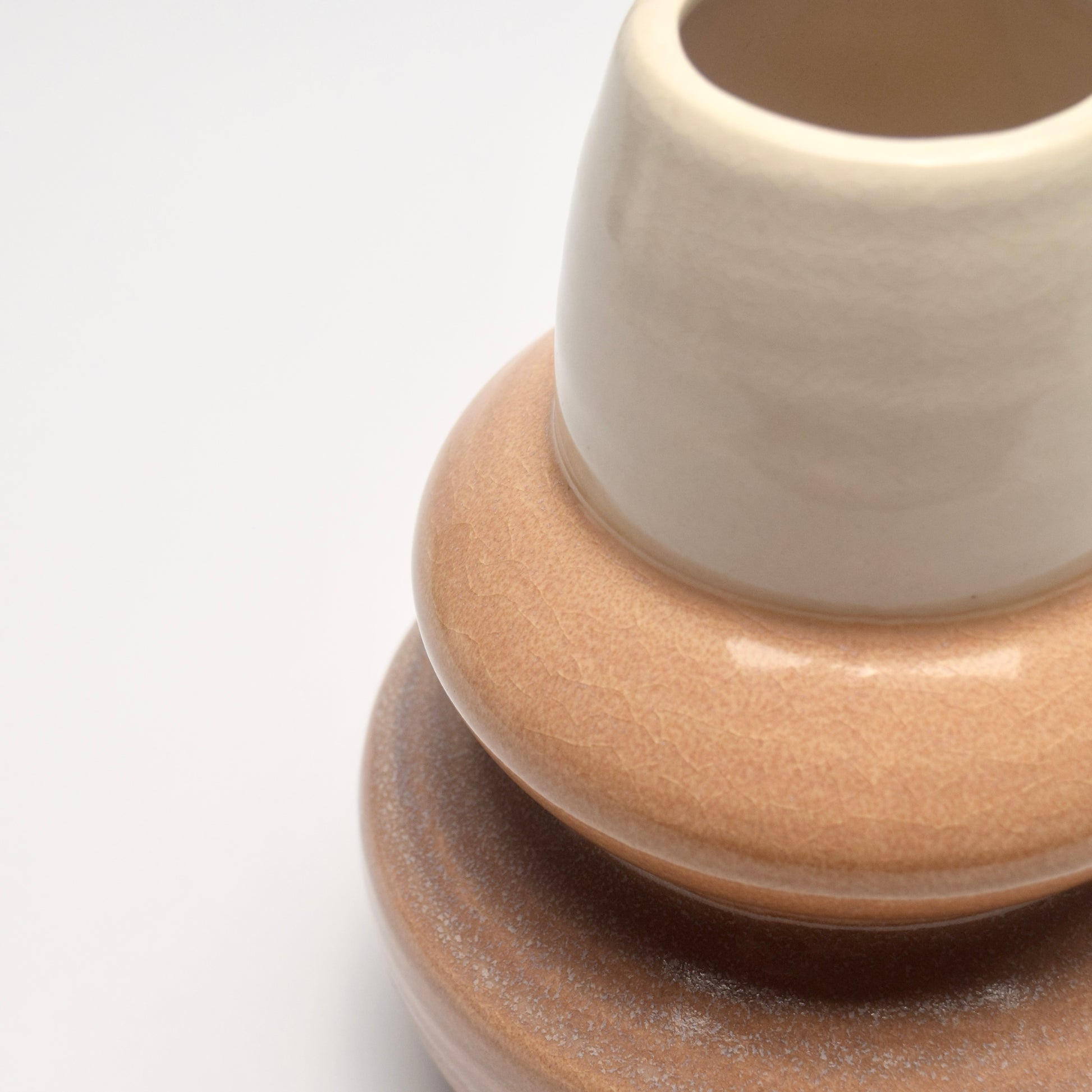 Ceramic vase with 3 distinct sections with different neutral tones creating ombre effect for home styling
