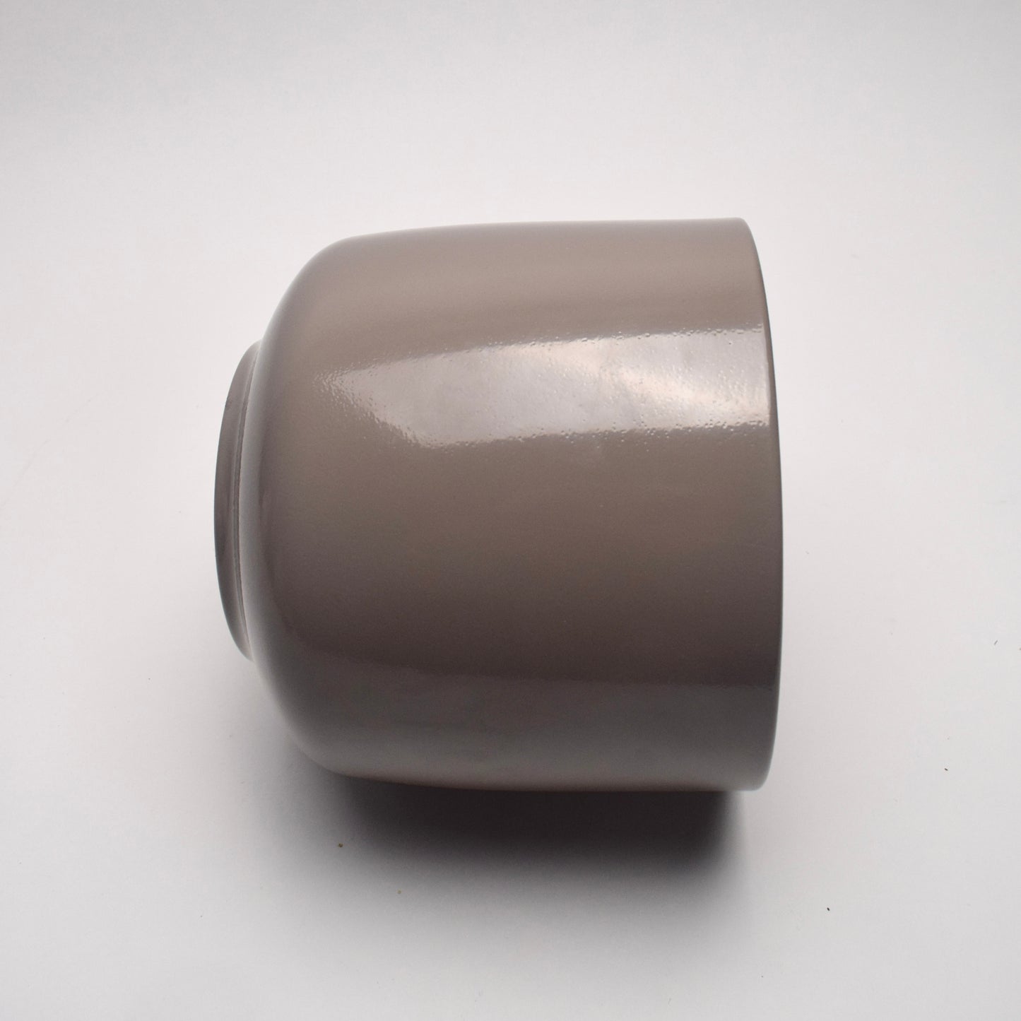 Taupe glazed ceramic plant pot with shiny smooth surface