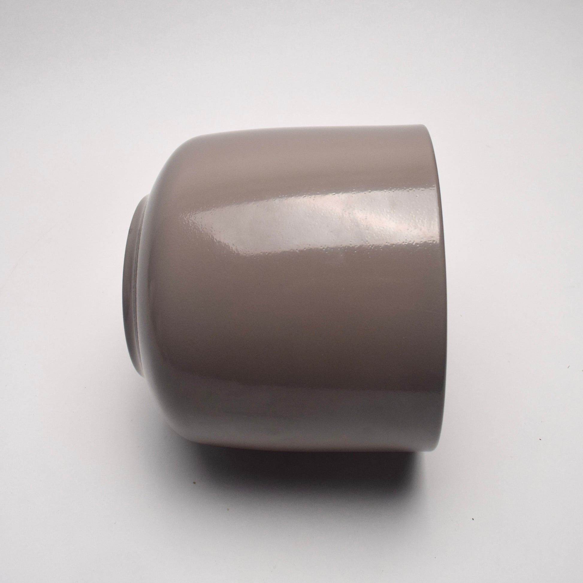 Taupe glazed ceramic plant pot with shiny smooth surface