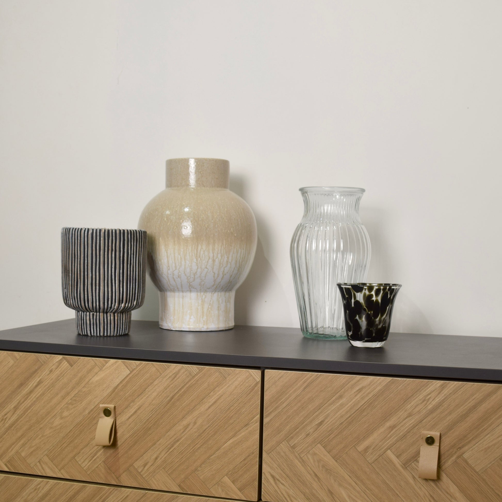 Vases on a wooden cabinet for interior home decor